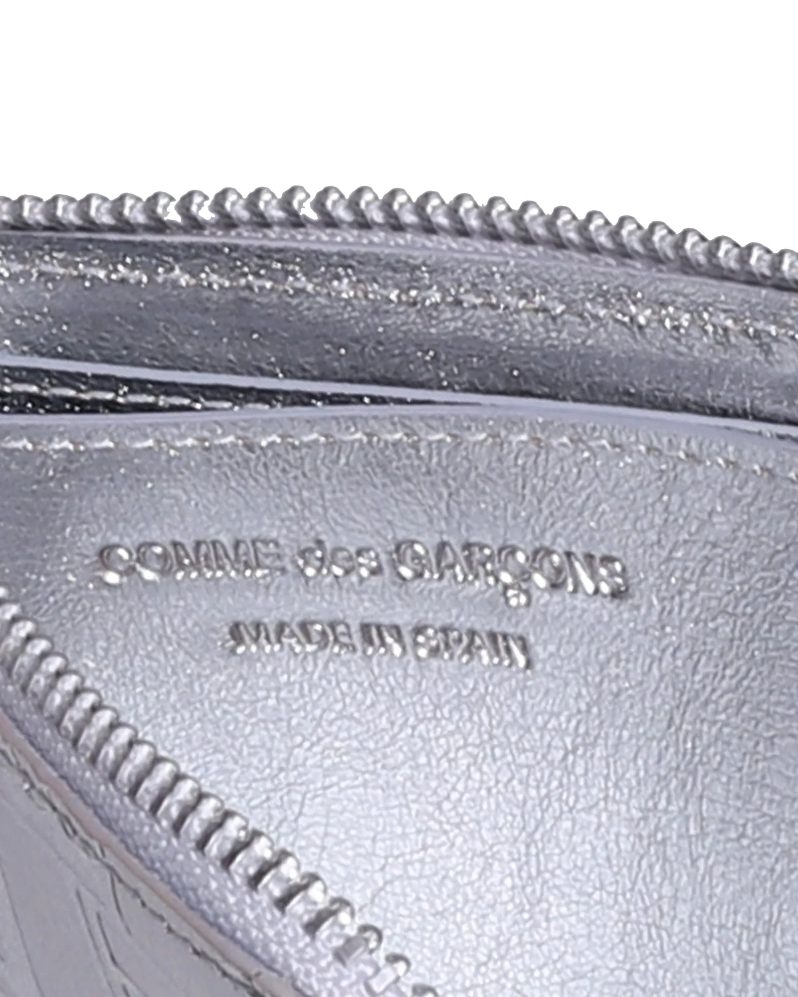 Comme des Garons Logo Embossed Detail Zipped Wallet
