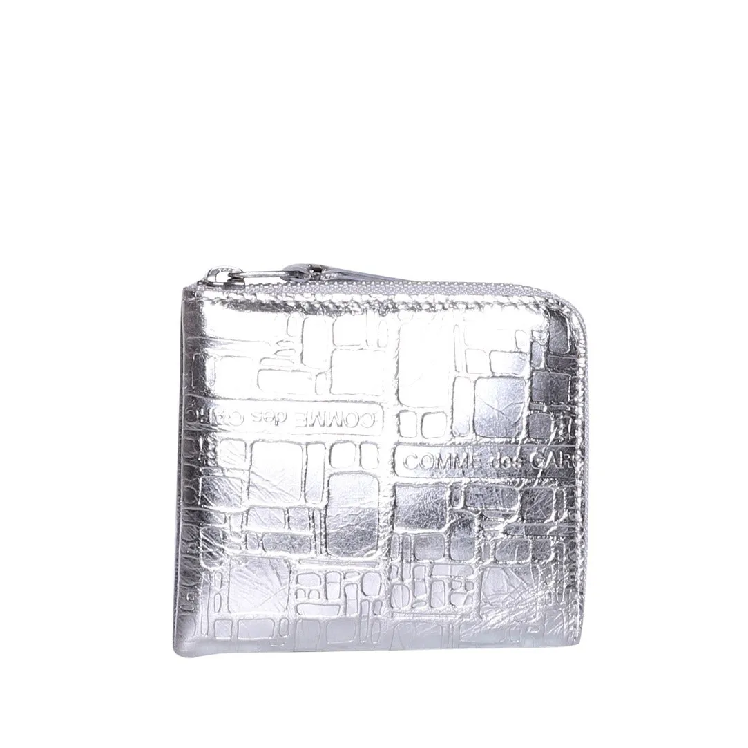 Comme des Garons Logo Embossed Detail Zipped Wallet