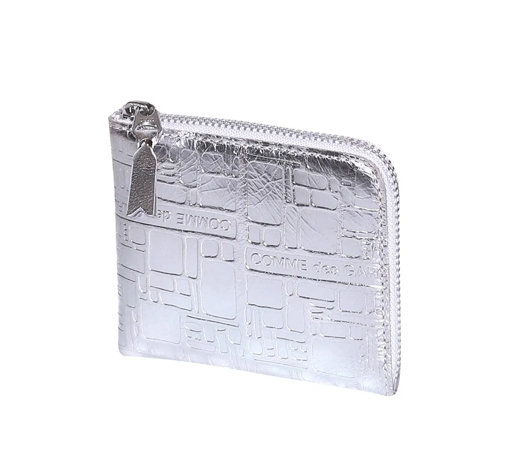Comme des Garons Logo Embossed Detail Zipped Wallet