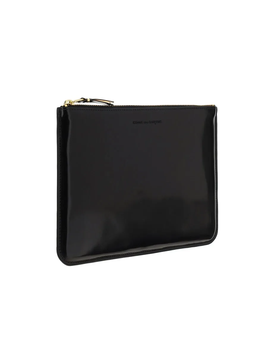 Comme des Garons Wallet Logo Embossed Zipped Pouch